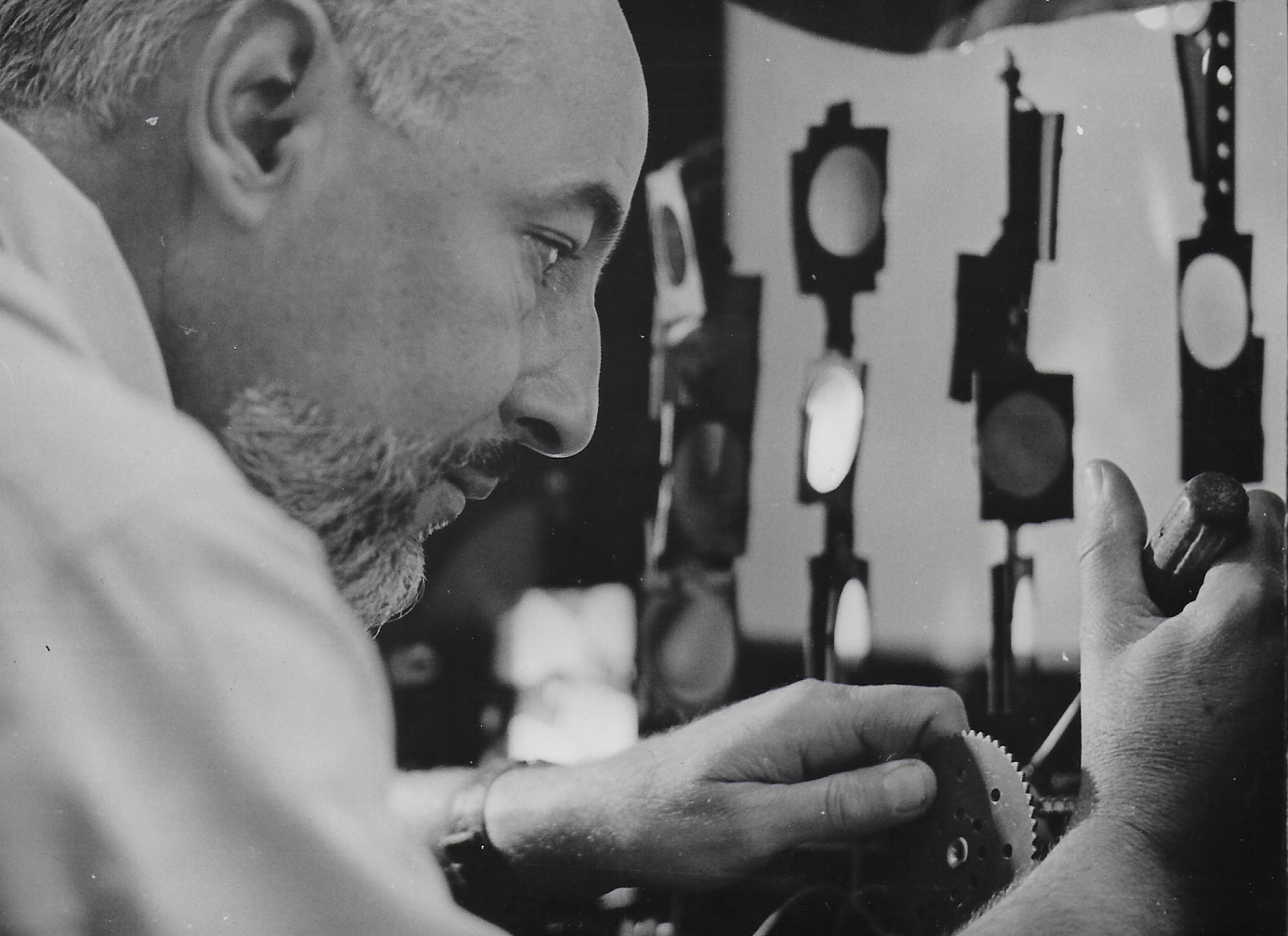 Frank J. Malina working on kinetic art mechanism